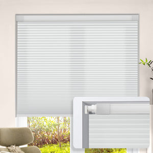 Light gray no-drill cellular honeycomb shade: on a window