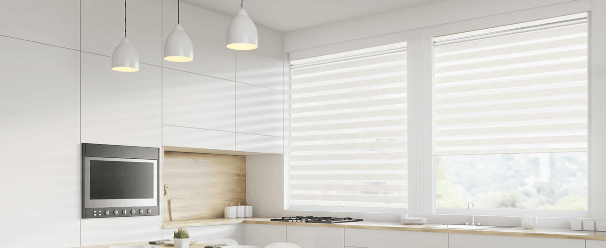White zebra blinds above a kitchen counter