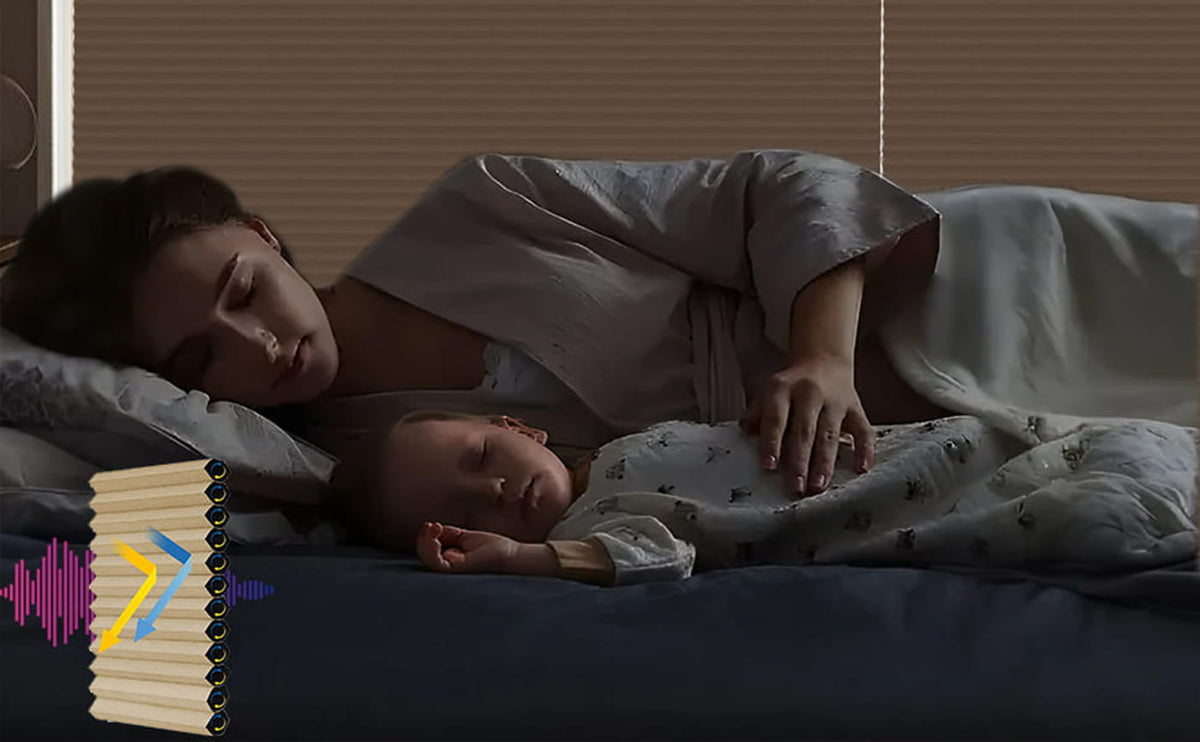 Adult and child resting in a darkened room