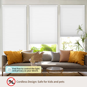 White no-drill cellular honeycomb shade: above a window seat