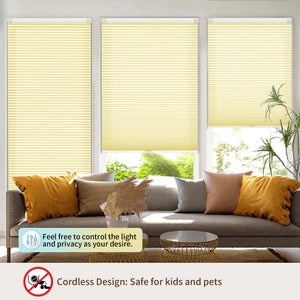 Yellow no-drill cellular honeycomb shade: above a window seat