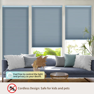 Blue no-drill cellular honeycomb shade: above a window seat