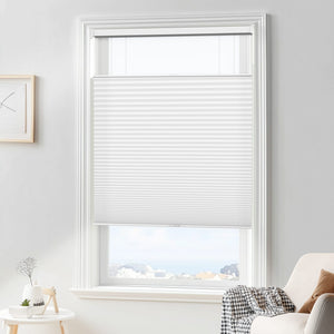 White top-down bottom-up cellular honeycomb shade: in a furnished room