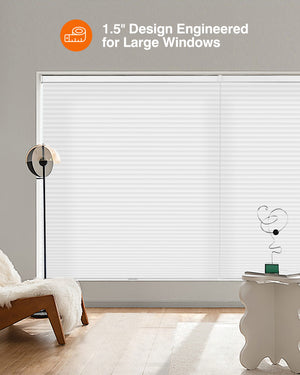 White cellular honeycomb shade: in a furnished room