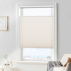 Cream top-down bottom-up cellular honeycomb shade: in a furnished room