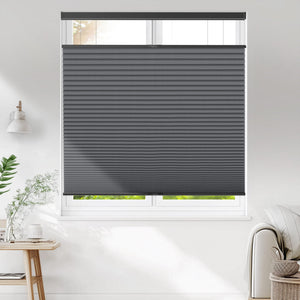 Dark gray top-down bottom-up cellular honeycomb shade: on a window