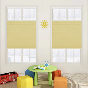 Yellow top-down bottom-up cellular honeycomb shade: on paired windows