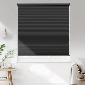 Black cellular honeycomb shade: on a window