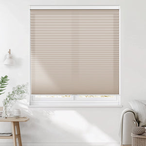 Taupe cellular honeycomb shade: on a window