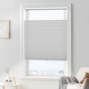 Gray top-down bottom-up cellular honeycomb shade: in a furnished room