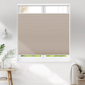 Taupe top-down bottom-up cellular honeycomb shade: on a window
