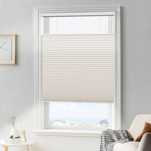 Cream top-down bottom-up cellular honeycomb shade: in a furnished room