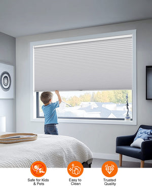 Gray cellular honeycomb shade: cordless lift operation