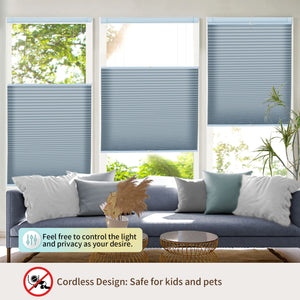 Blue top-down bottom-up no-drill cellular honeycomb shade: above a window seat