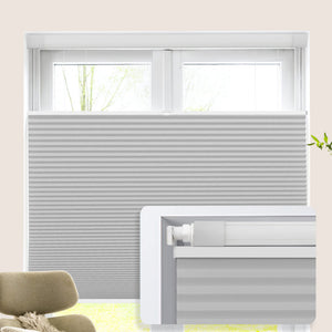 Light gray top-down bottom-up no-drill cellular honeycomb shade: on a window