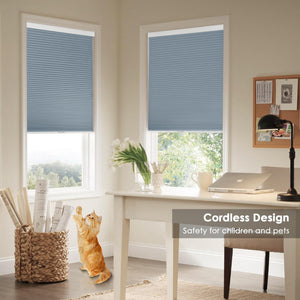 Blue cellular honeycomb shade: on paired windows