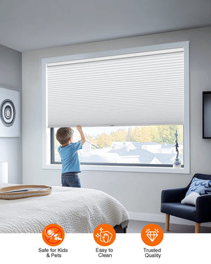 White cellular honeycomb shade: cordless lift operation