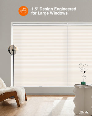 Cream cellular honeycomb shade: in a furnished room