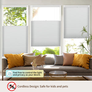 Gray top-down bottom-up no-drill cellular honeycomb shade: above a window seat