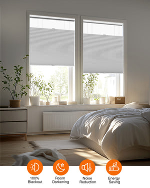 Gray top-down bottom-up cellular honeycomb shade: in a furnished room