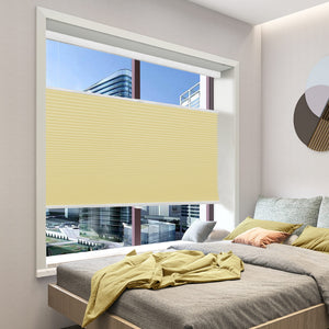 Yellow top-down bottom-up cellular honeycomb shade: in a bedroom
