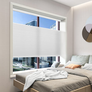 White top-down bottom-up cellular honeycomb shade: in a bedroom