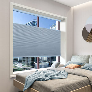 Blue top-down bottom-up cellular honeycomb shade: in a bedroom