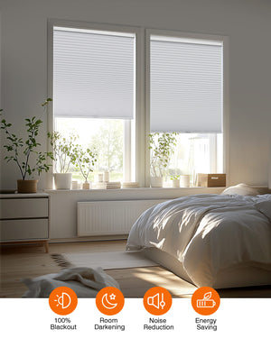 White cellular honeycomb shade: in a furnished room