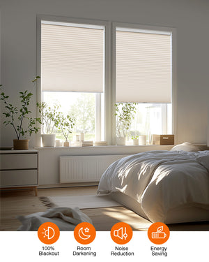Cream cellular honeycomb shade: in a furnished room