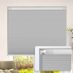 Light gray no-drill cellular honeycomb shade: on a window