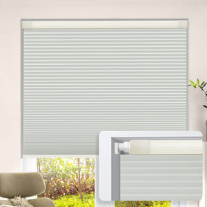 Off-white no-drill cellular honeycomb shade: on a window