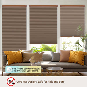 Brown no-drill cellular honeycomb shade: above a window seat