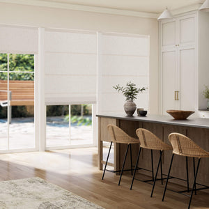 Cream Roman shade: in a dining room