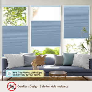 Blue top-down bottom-up no-drill cellular honeycomb shade: above a window seat