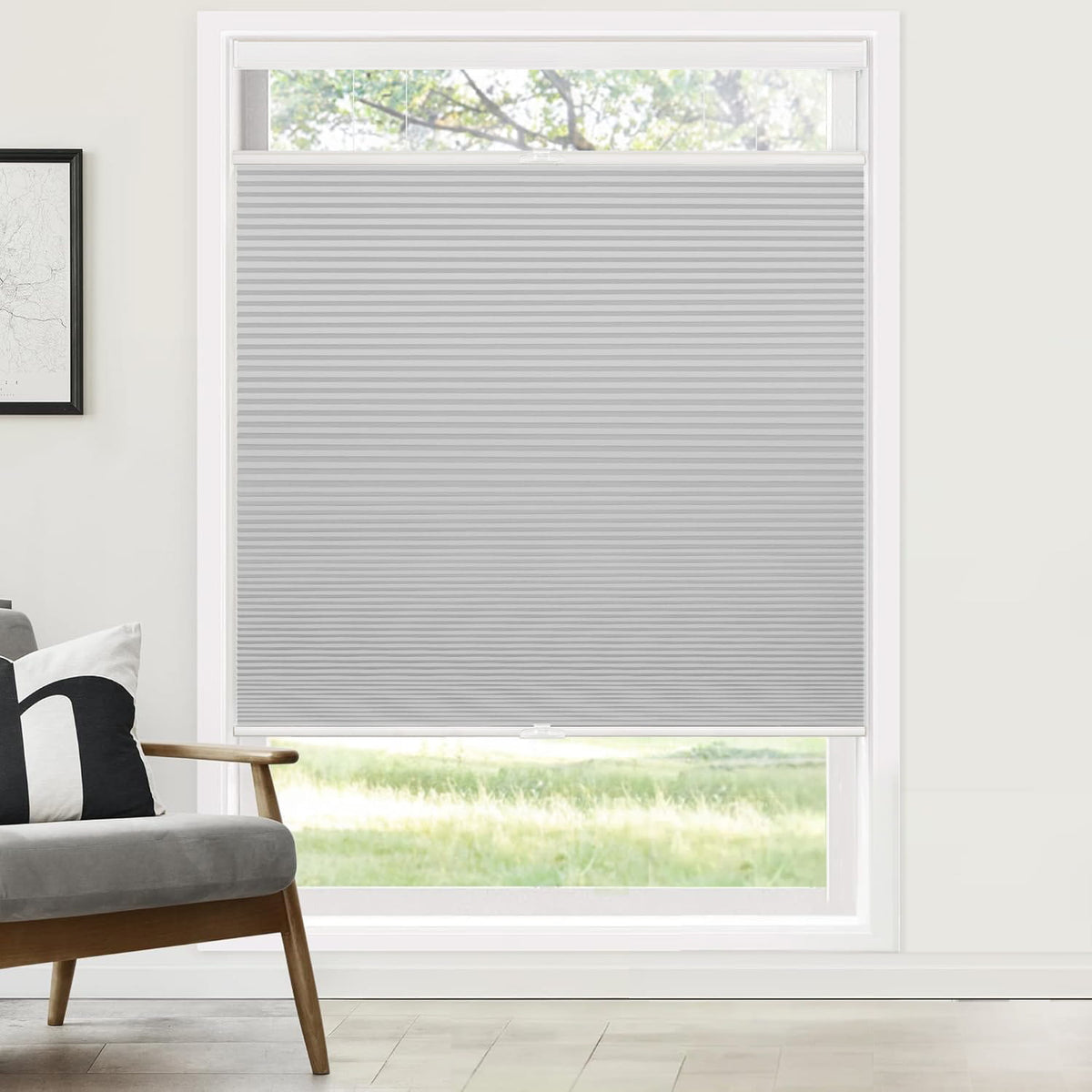 Gray top-down bottom-up cellular honeycomb shade: on a window