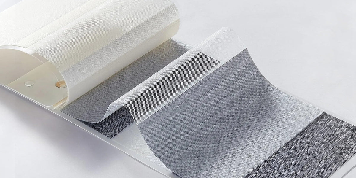 Window shade fabric samples arranged in a row