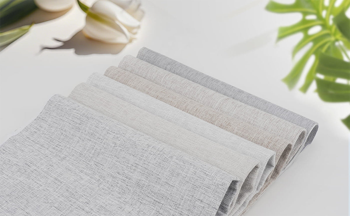 Roman shade fabric samples in pale neutral colors