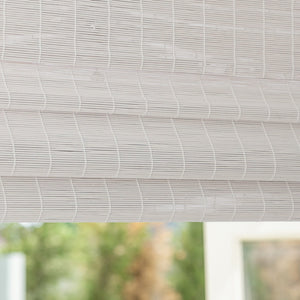 White bamboo Roman shade: folded fabric close-up