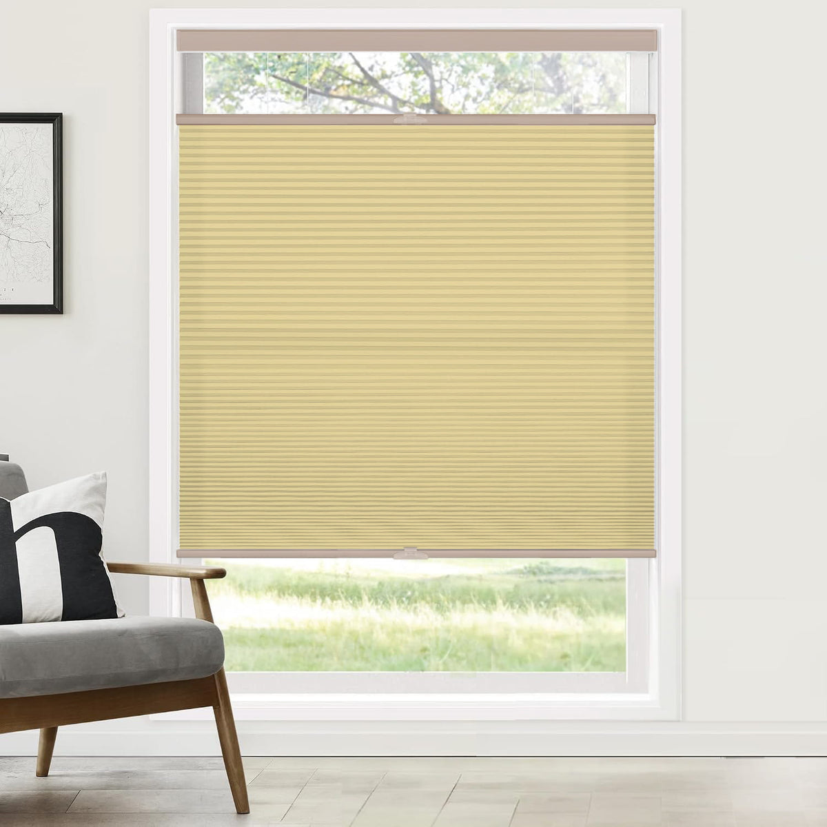 Yellow top-down bottom-up cellular honeycomb shade: on a window