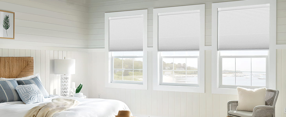 White cellular shades on bedroom windows