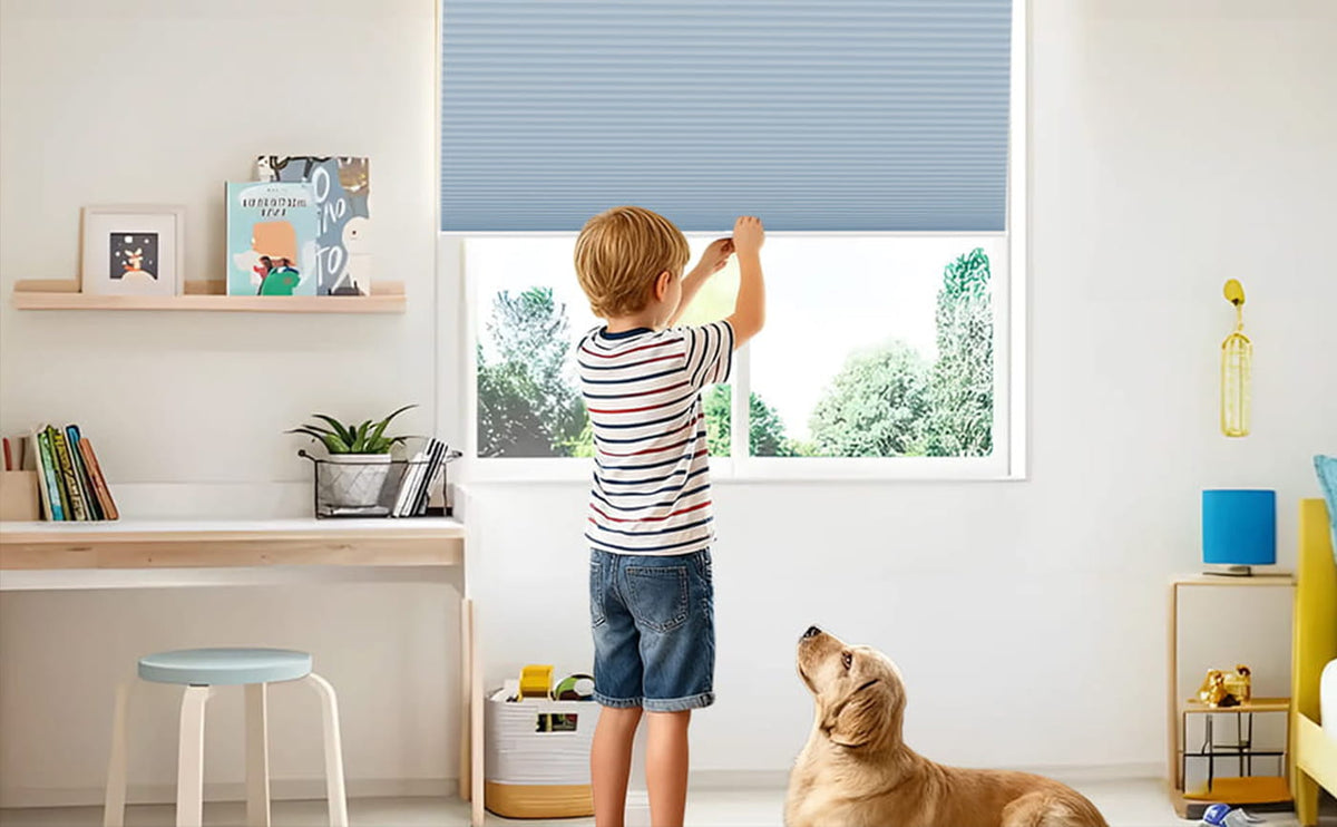 Child and dog beside a cordless cellular shade