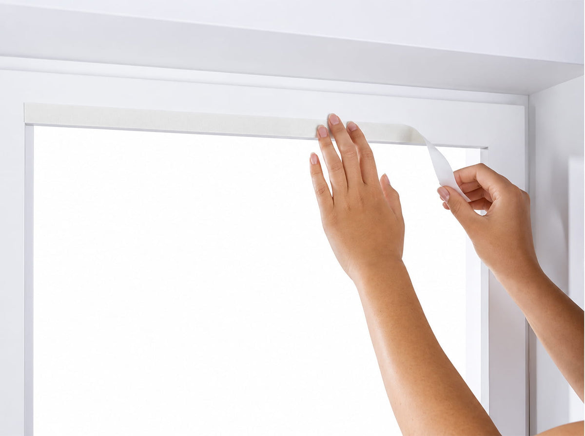 Applying adhesive mounting strip for no-drill window shades