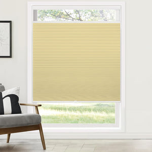 Yellow top-down bottom-up cellular honeycomb shade: on a window