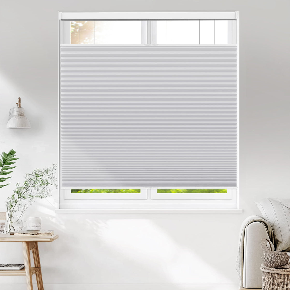 Gray top-down bottom-up cellular honeycomb shade: on a window