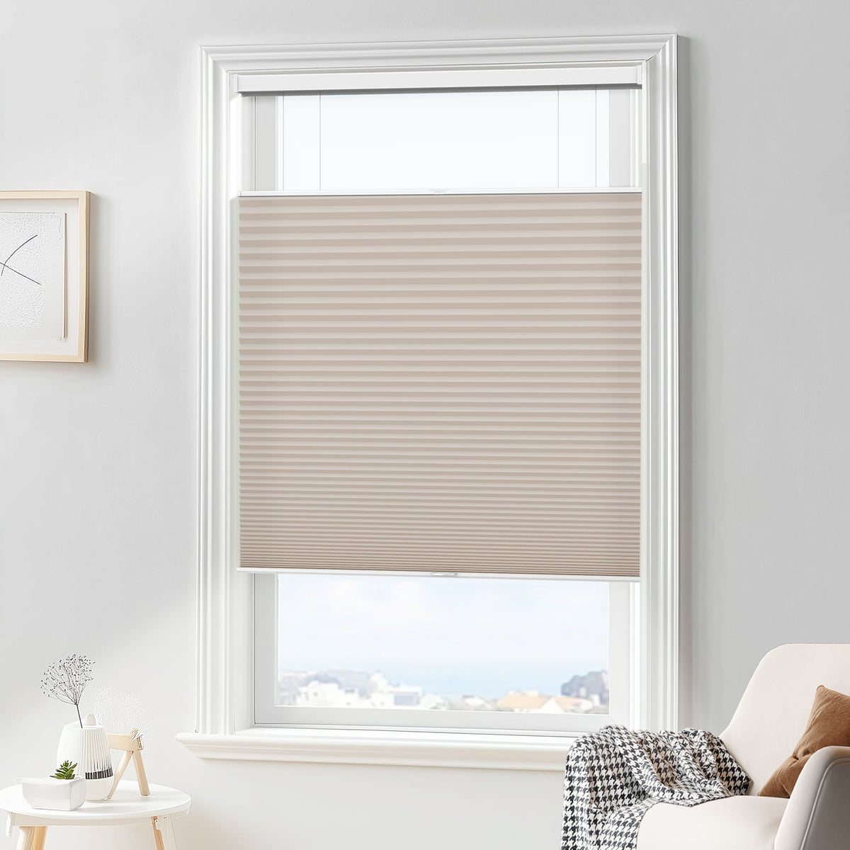 Taupe top-down bottom-up cellular honeycomb shade: in a furnished room