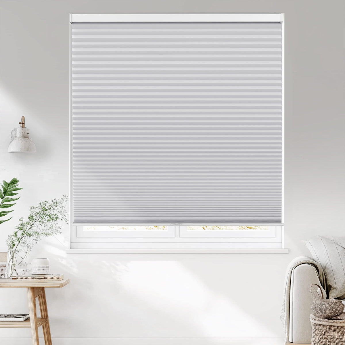 Gray cellular honeycomb shade: on a window