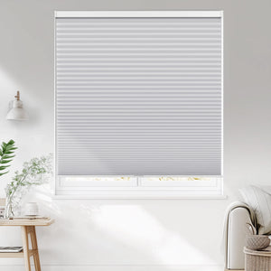 Gray cellular honeycomb shade: on a window