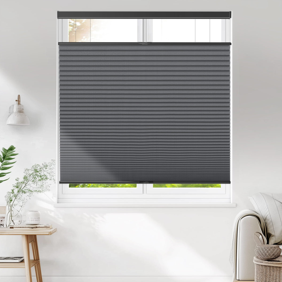 Dark gray top-down bottom-up cellular honeycomb shade: on a window