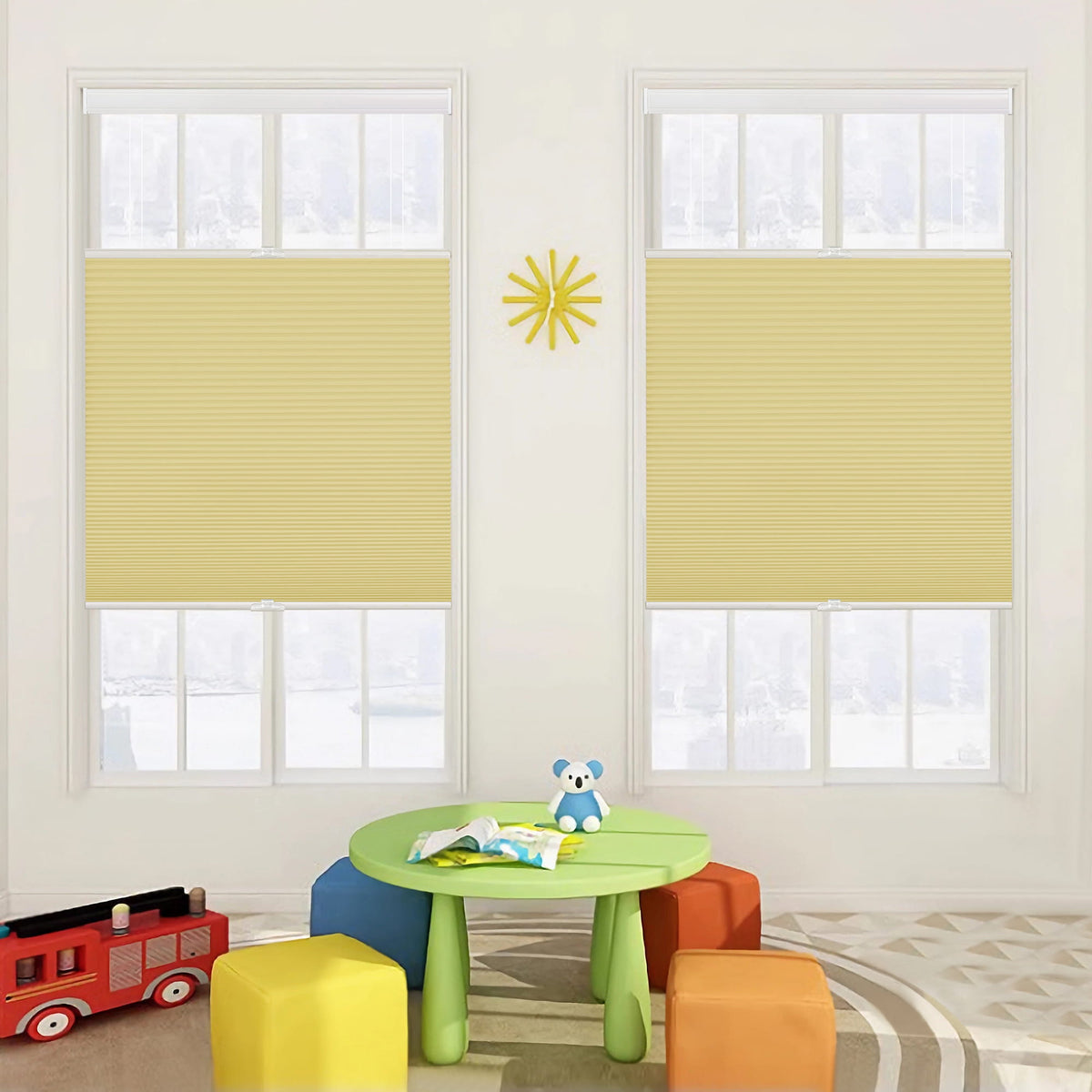 Yellow top-down bottom-up cellular honeycomb shade: on paired windows