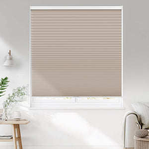 Taupe cellular honeycomb shade: on a window